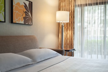 Suite, 1 Bedroom,  King Bed, & Sofa Bed, Balcony, Pool View