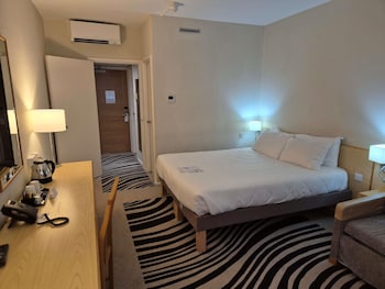 Superior room with queen bed and sofa bed