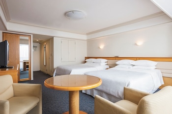 Guest room, 2 Double Beds, Disney or Bay view, Main Building, Balcony