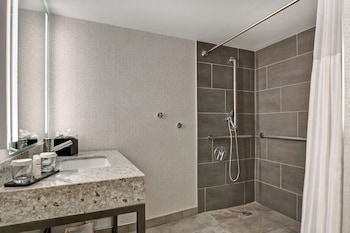 Suite, 1 King Bed, Accessible, Corner (Roll-In Shower)