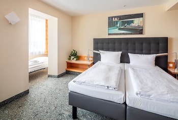 Studio Deluxe Triple Room