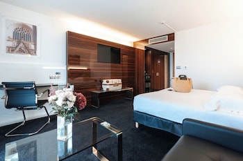Chambre DELUXE grand lit et canapé-lit pour enfant de 12 ans maximum