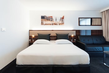 Chambre DELUXE grand lit et canapé-lit pour enfant de 12 ans maximum