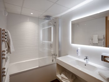 Chambre EXECUTIVE avec lits jumeaux et canapé-lit pour enfant de 12 ans maximum